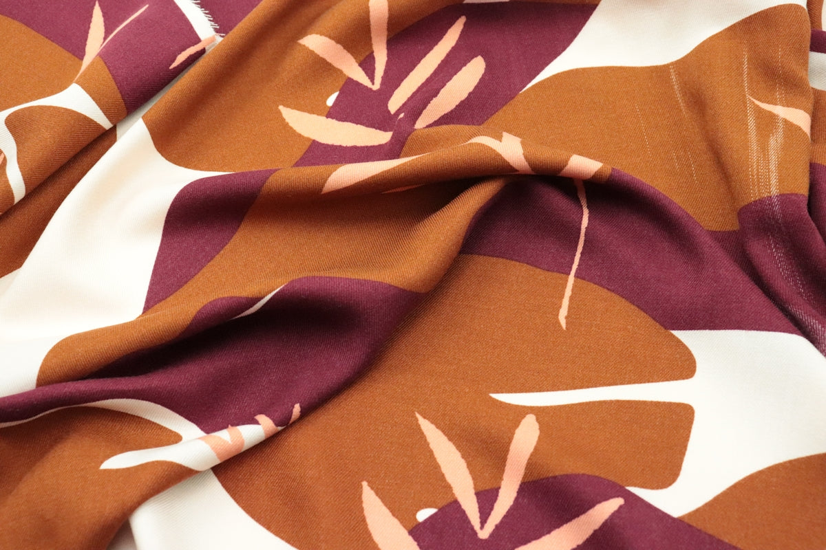 a close up of a fabric with a flower pattern